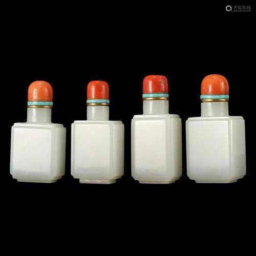 A GROUP OF FOUR SQUARED WHITE JADE SNUFF BOTTLES