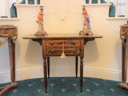 A Late Regency Rosewood Brass Inlaid Side table. With a pair...