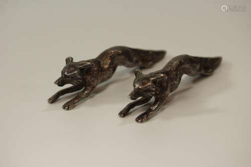 A Pair of Silver Coloured Metal Cast Figures of Foxes. Appar...
