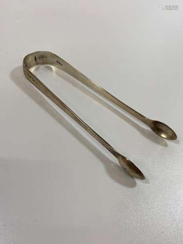 A Pair of George III Sterling Silver Sugar Tongs. Solomon Ho...