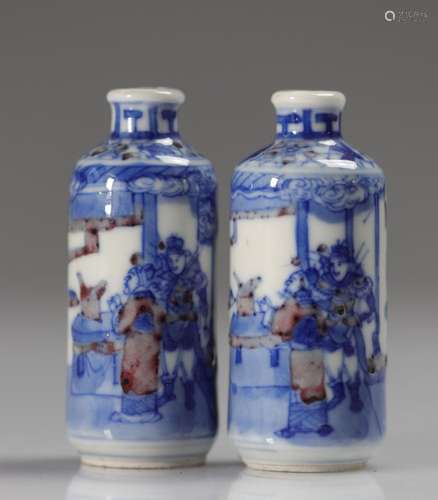 China pair of white blue and iron red snuffboxes