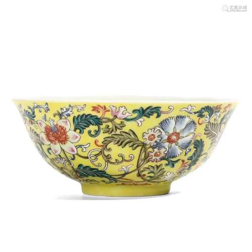 A YELLOW-GLAZED FLORAL BOWL