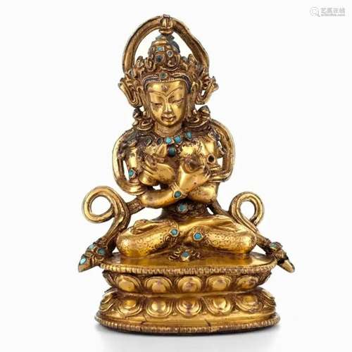 A GILT-BRONZE FIGURE OF A GUARDIAN, TIBET