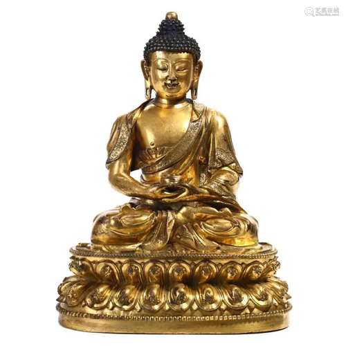 A GILT-BRONZE FIGURE OF SEATED SHAKYAMUNI, CHINA