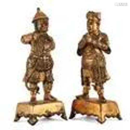 A PAIR OF GILT-BRONZE FIGURES OF GUARDIANS