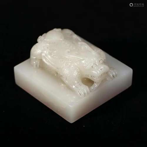 A WHITE JADE 'DRAGON' SEAL, CHINA