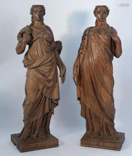 Pair of finely carved wooden young women statues