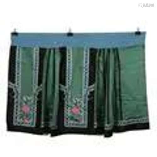 A GREEN-GROUND EMBROIDERED LADY'S SKIRT