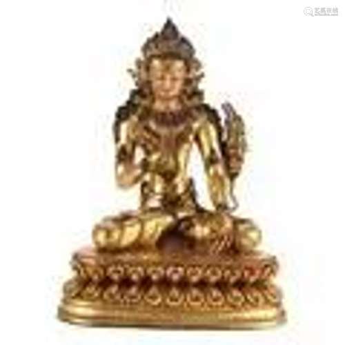 A GILT-BRONZE FIGURE OF SEATED BODHISATTVA