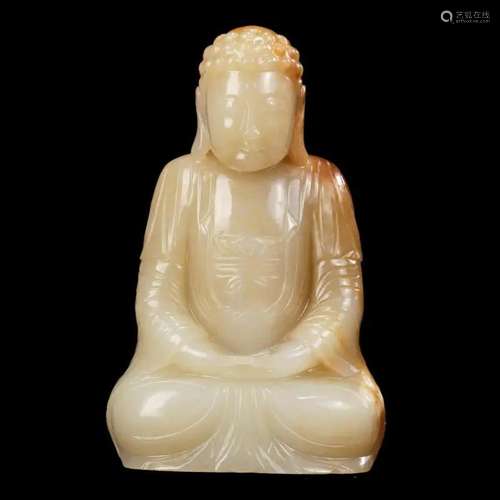 A WHITE JADE BUDDHA FIGURE