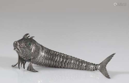 Articulated fish with stone-encrusted eyes