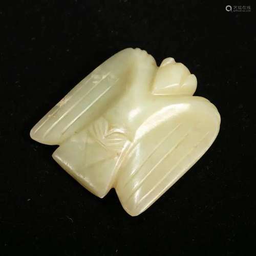 A WHITE JADE 'BIRD' PENDANT