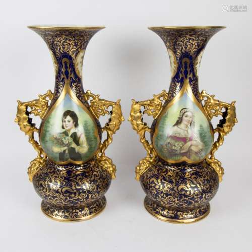 Pair of hand-painted vases in cobalt blue and gilded ornamen...