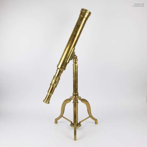 An English Stanley London brass telescope on a tripod stand,...