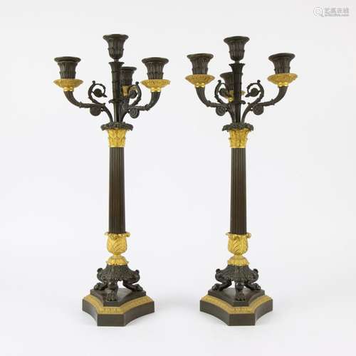 Pair of Empire patinated bronze and ormolu candlesticks, ear...