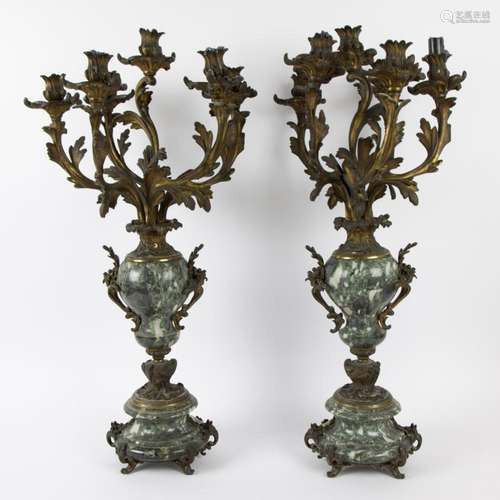 Pair of candlesticks in bronze with leaf motif and green-vei...