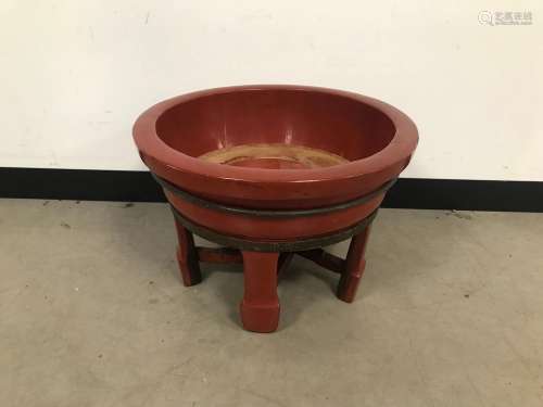 A vintage Chinese red lacquered planter, 54cm diameter