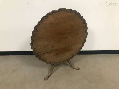 A George III mahogany wine table, AF, the pie crust rim tilt...