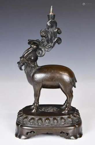 A Bronze Mythical Beast Candlestick 17thC