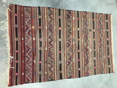 A mid 20th century Middle Eastern Kilim flat weave carpet, 2...