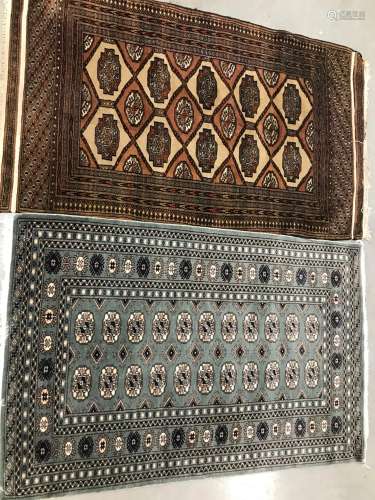 Three modern carpets, including a large red woollen example,...