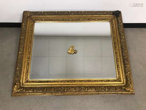 A modern and large gilt wall mirror, 135cm by 110cm, one cor...