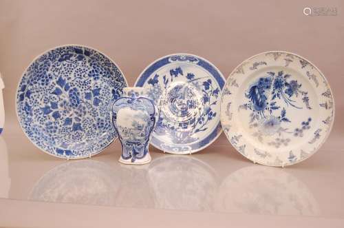 Two 19th century Delft pottery items, the charger restored, ...
