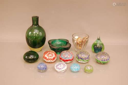 A group of glassware and glass paperweights, to include a co...