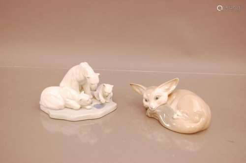 Two Lladro porcelain groups, one with a polar bear and cubs,...