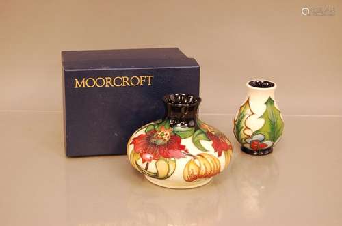 Two Modern Moorcroft pottery vases, one squat example with T...