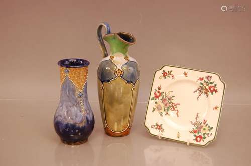 Three ceramic items of Royal Doulton, including two vases, o...