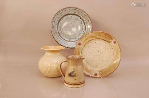 Four items of studio pottery, comprising a wide necked globu...