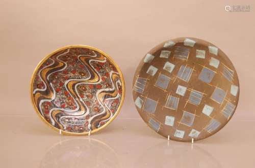 Two studio pottery plates, the earthenware copper-glazed exa...