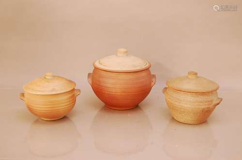 Three two handled unglazed pots and covers, by John Bedding,...