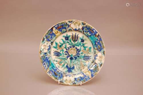 An antique Middle Eastern plate, AF, cracked, 26cm diameter
