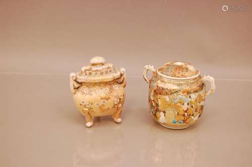 Two late Meiji period Japanese satsuma style urns with lids,...