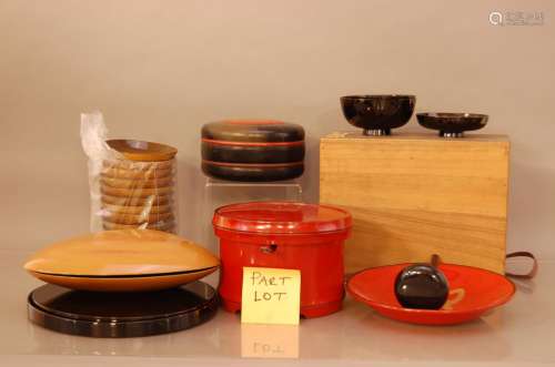 A large collection of lacquer tableware, including bowls, sa...