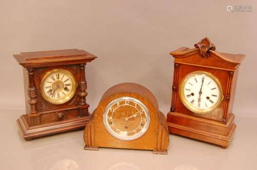 A group of three mantle clocks, comprising two 14 day striki...