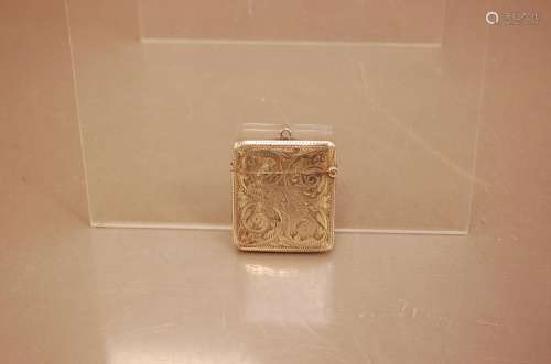 A late Victorian silver vesta case, 4.5cm high, with engrave...
