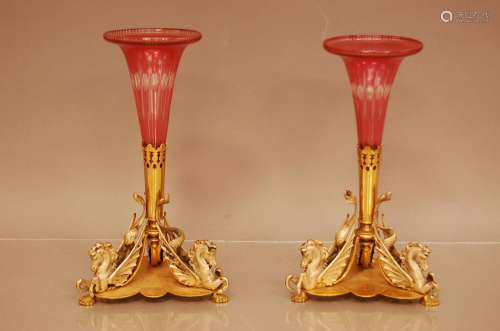 A pair of late 19th century brass and glass topped vases, cr...