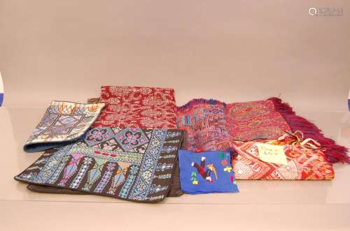 A collection of assorted textiles, including examples from t...