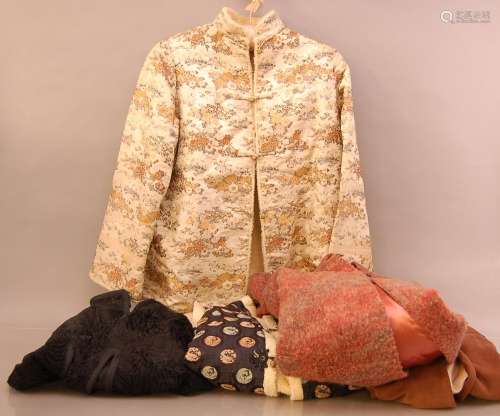 A collection of ladies coats, including Far Eastern style co...
