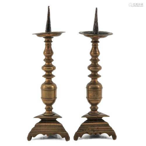 A Pair of 17th Century Bronze Candleticks