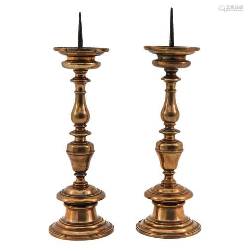 A Pair of 17th Century Bronze Candlesticks