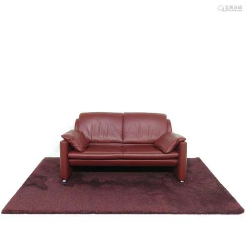 A Leolux Leather Sofa and Sauvage Carpet