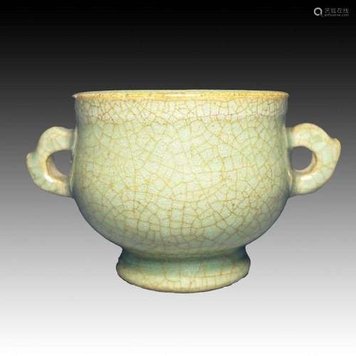 A CHINESE CELADON CENSOR, PROBABLY MING TO YUAN PERIOD