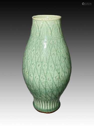 A CHINESE CARVED CELADON VASE, MING DYNASTY