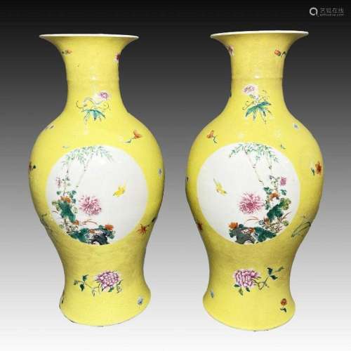 A PAIR OF CHINESE YELLOW GROUND FAMILLE ROSE VASES, QING DYN...