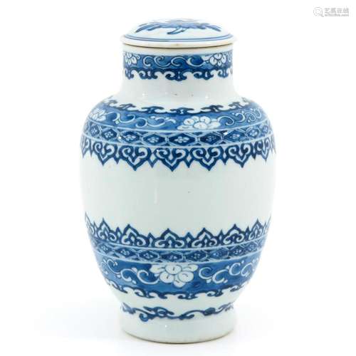 A BLUE AND WHITE JAR AND COVER