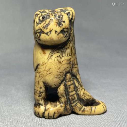 SIGNED TOMOTADA NETSUKE TIGER, 18TH CENTURY